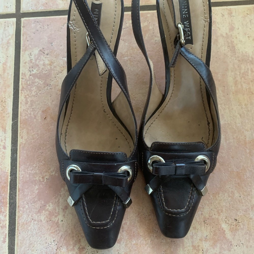 Chocolate Brown Nine West shoes. Classic shoes. Lifts are worn.